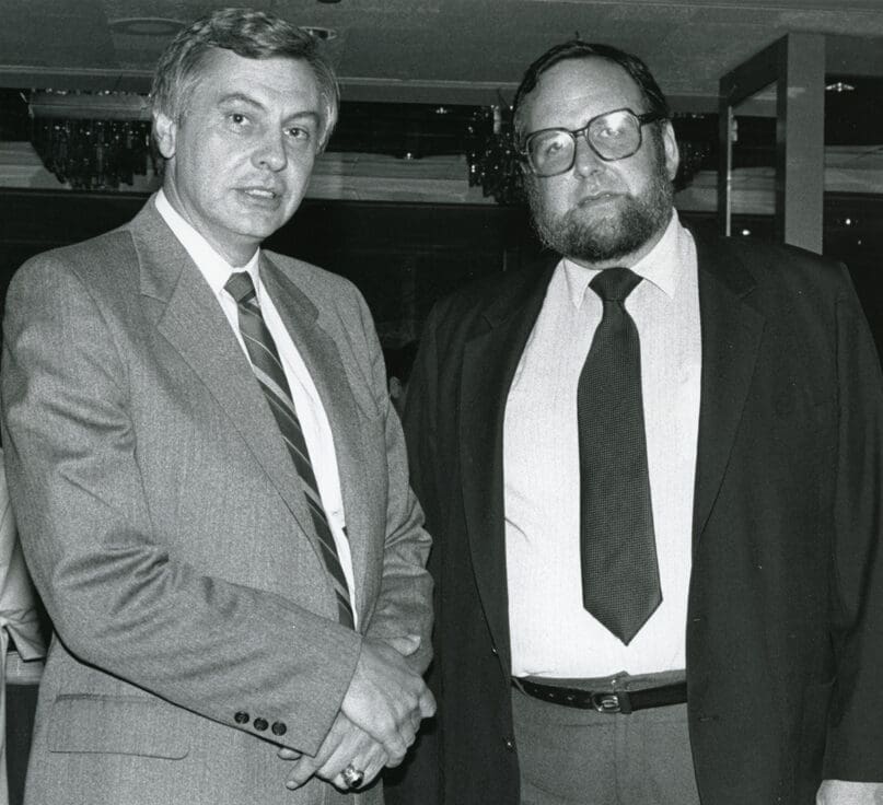 Commissioner Thomas Maul standing with Michael Goldfarb