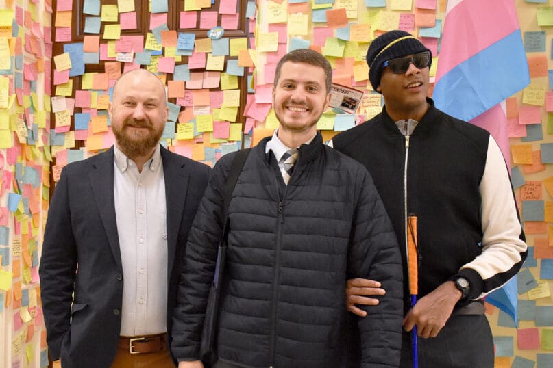 Matt Estep, Tommy Heller, and Chad DeRoche in front of Rep. Alexandria Ocasio Cortez's office