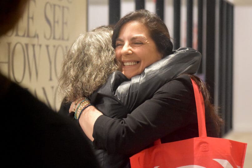 Kate Mammolito hugs Shirley Berenstein