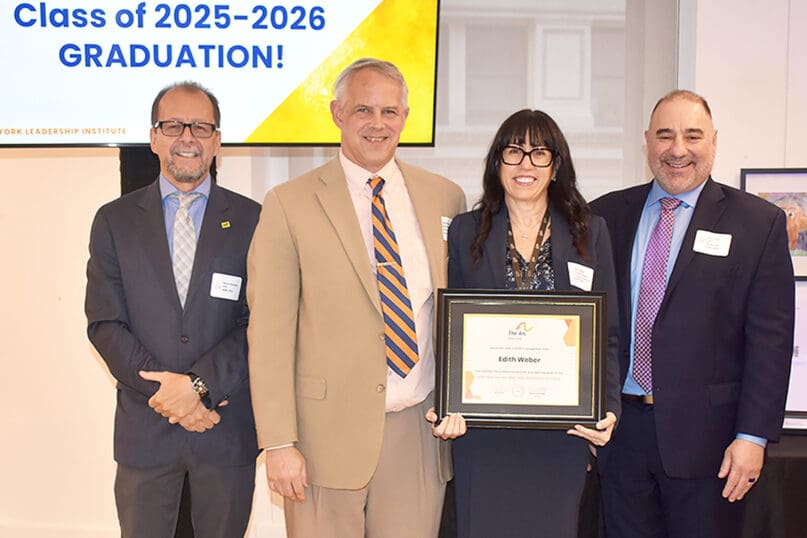 left to right, Marco Damiani, Dan Martindale, Edie Weber, and Eric Geizer